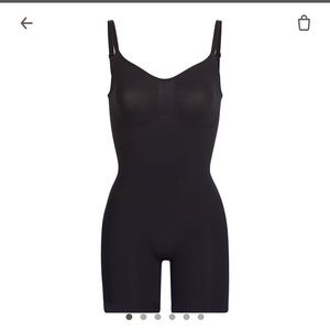 Skims skull ring body suit mid thigh